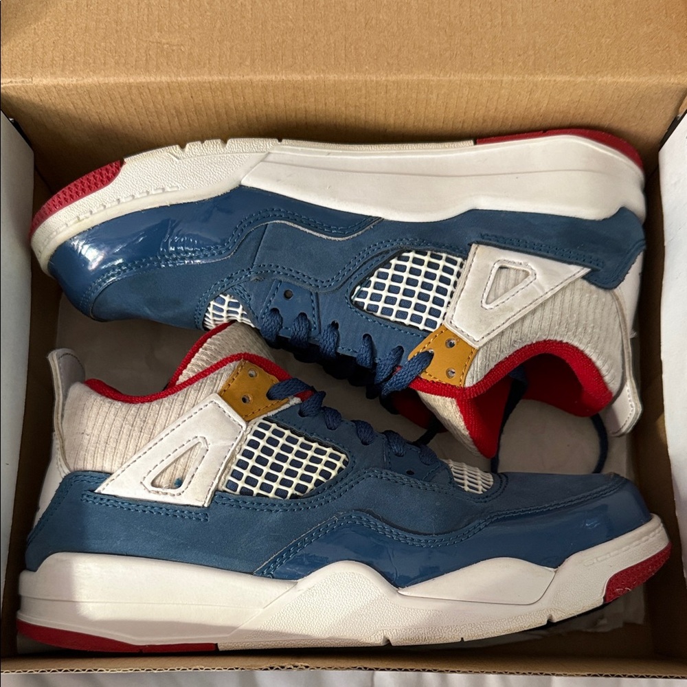 Kids Jordan 4’s  Stylish Blue and Red Sneakers